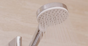 Shower with tankless water heaters