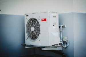outdoor unit undergoing AC maintenance